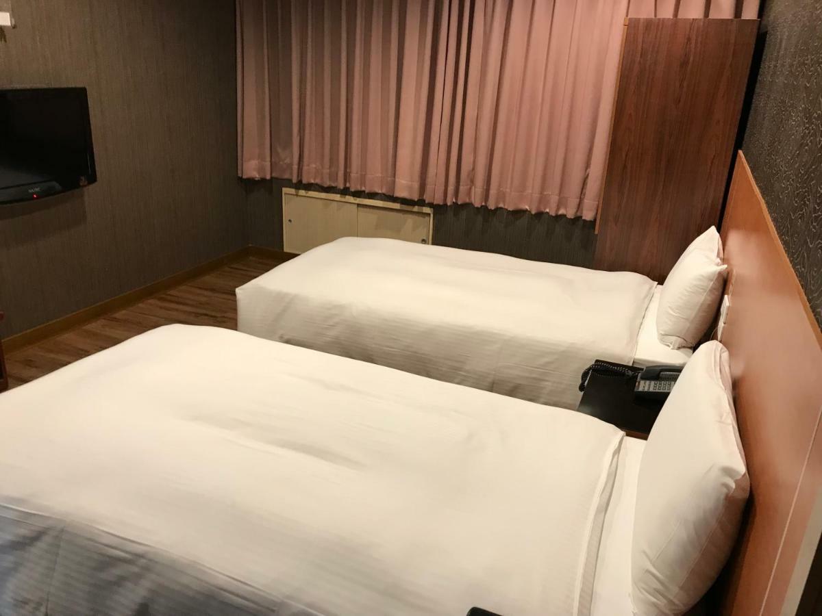 Long Siang Hotel Kaohsiung Bagian luar foto